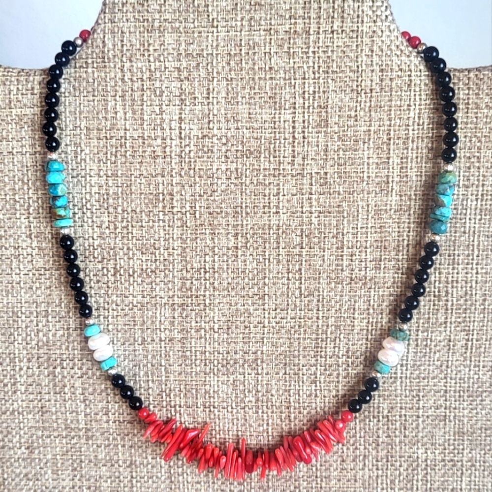 Onyx, Turquoise, Pearl, And coral choker.